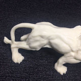 statue de lion en ivoire 